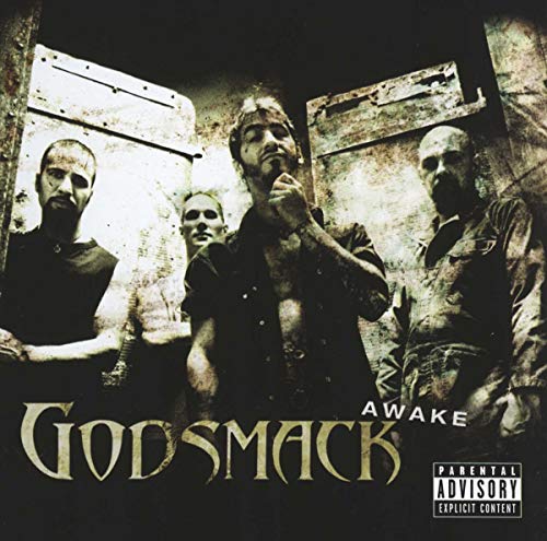 Godsmack album cover, “Awake”, featuring three men in a distressed setting.