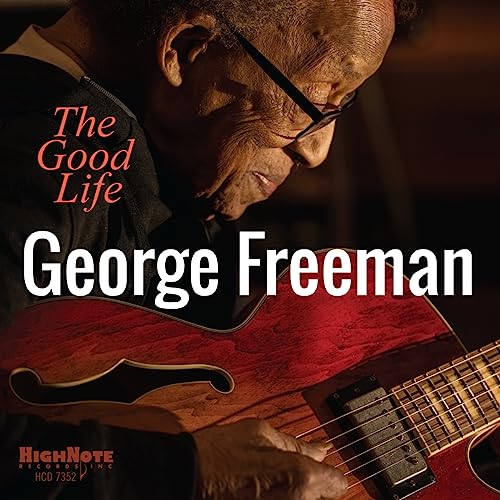 George Freeman plays a reddish-brown guitar, album cover art.