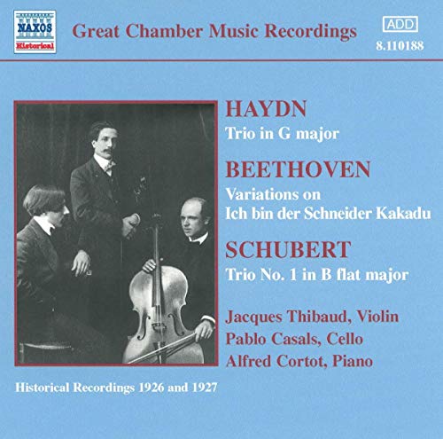 CD cover featuring a black and white photo of three musicians with instruments.