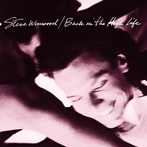 Steve Winwood album cover, "Back in the High Life", close-up portrait.