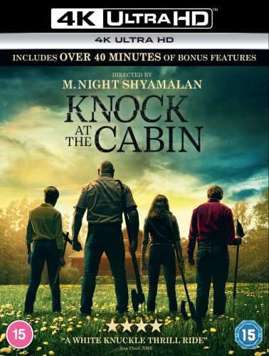 Knock at the Cabin" Blu-ray cover featuring four figures in a field.