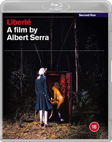 Liberte" Blu-ray cover: woman in blue coat, nude figure in doorway, forest.