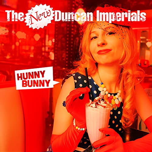 CD cover: woman with milkshake, red gloves, and polka dot dress.