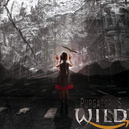 Girl stands before a decaying building with a bird flying above.