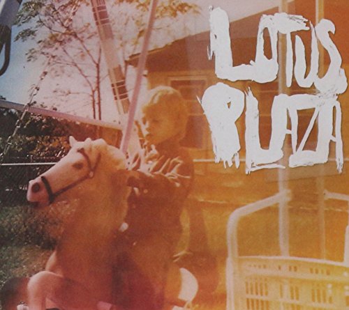CD cover: child on a rocking horse, warm orange tones.