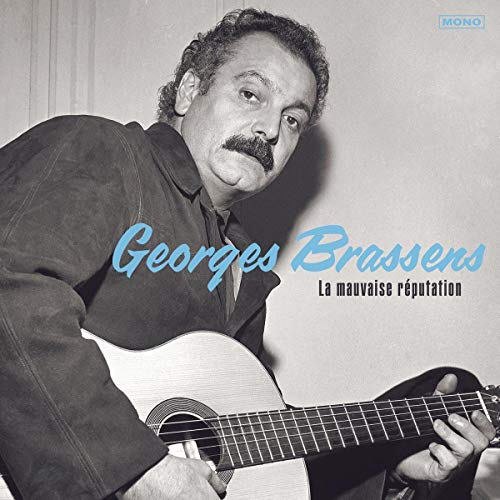 Black and white portrait of Georges Brassens playing an acoustic guitar.