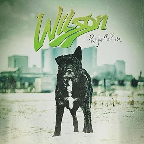 CD cover: "Wilson - Right To Rise" featuring a black dog and city skyline.