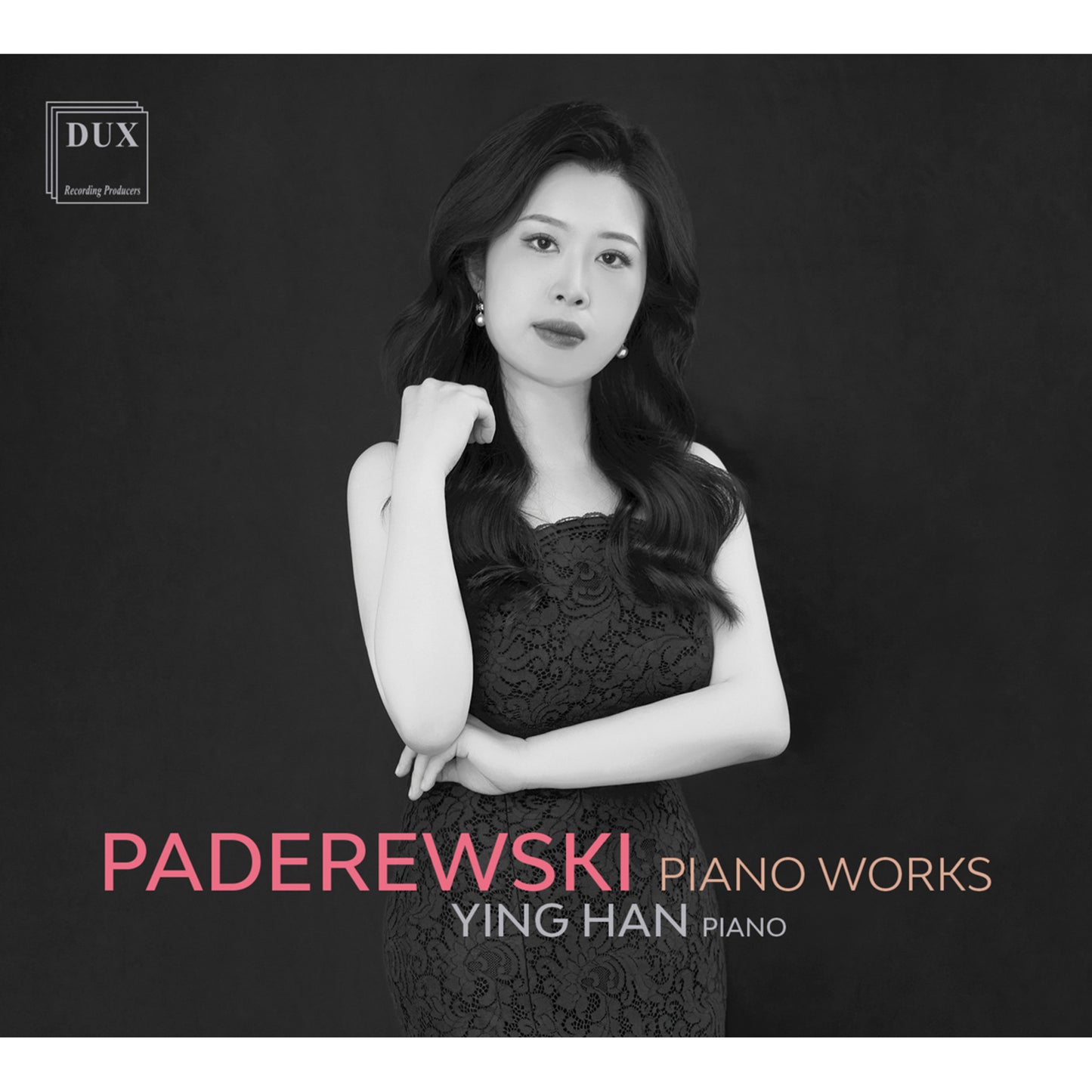 CD cover: pianist Ying Han in formal wear, dark background.