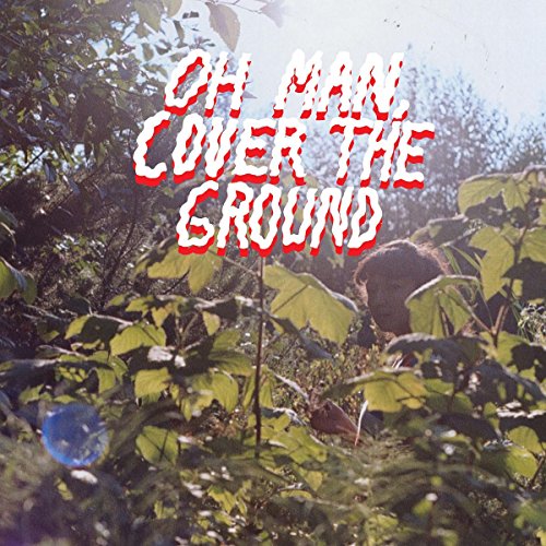 Album cover with text over a blurred, leafy outdoor scene.