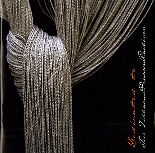 CD cover with abstract silver cords against a dark background.