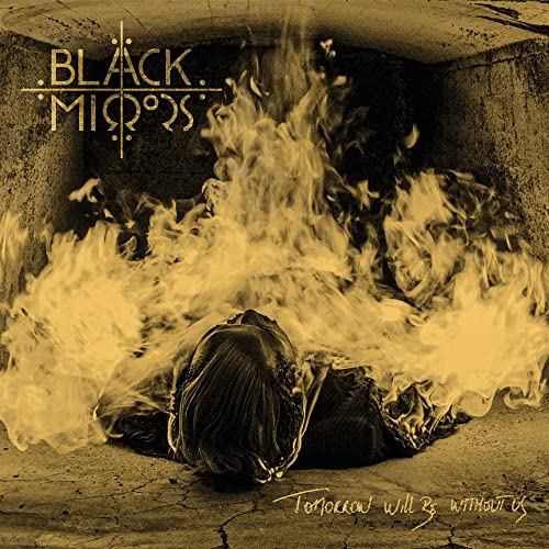 CD cover: person in flames within a concrete drainpipe.