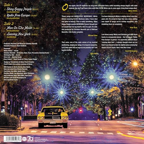 Back cover of Micky Dolenz Sings R.E.M. vinyl featuring tracklist and night street scene.