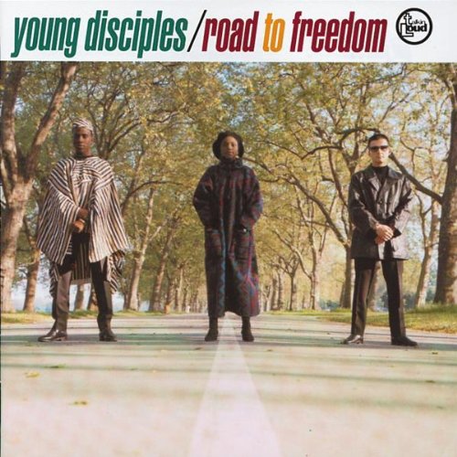 CD cover: Three people in traditional and modern clothing on a path.