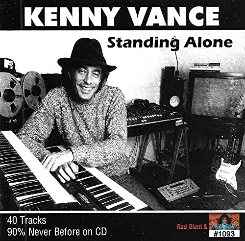 Kenny Vance album cover, black and white photo of musician at piano.