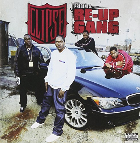 CD cover featuring four men posing with a dark blue car.