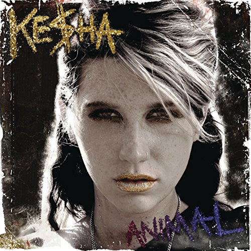 Album cover featuring a close-up portrait of Ke$ha with gold glitter lips and text.
