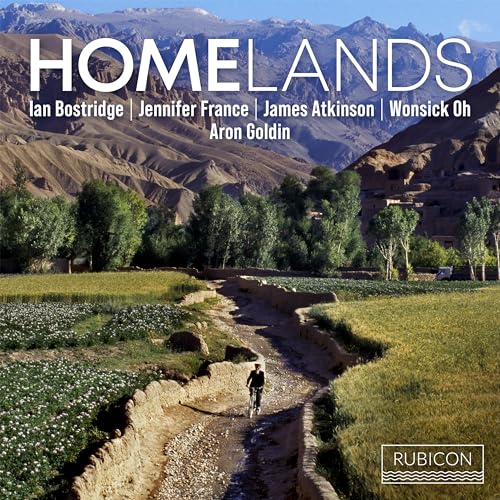 CD cover: mountainous landscape with a dirt road and a lone figure.