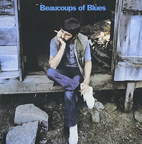 Ringo Starr album cover: man with cigarette in doorway.