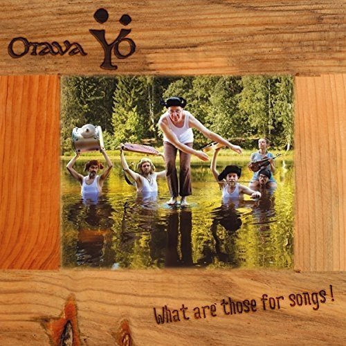 CD cover: group in water with instruments, wood frame border.