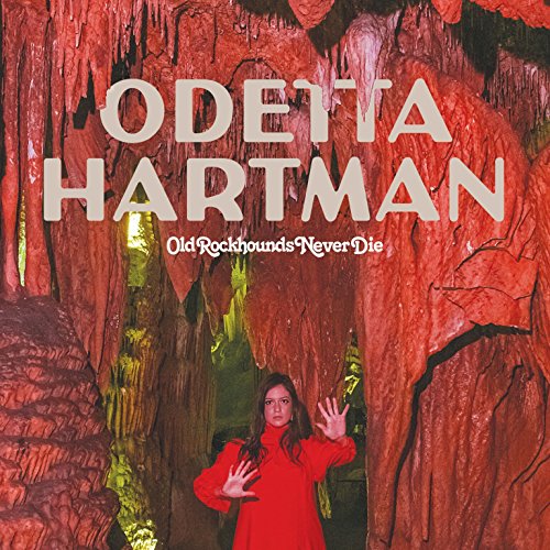 CD cover: Odetta Hartman, woman in red within a red cave setting.