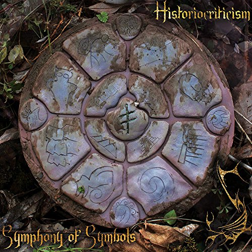 CD cover: stone wheel with carved symbols and foliage.