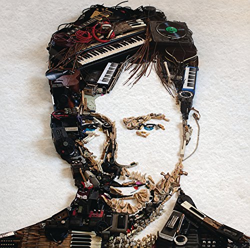 Portrait of a man constructed from electronic components and musical keys.