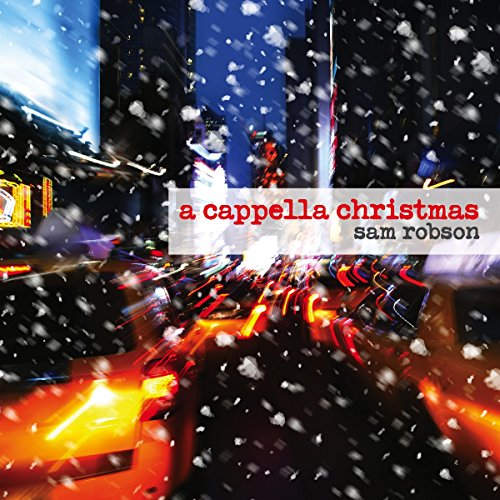 CD cover with blurred city lights and falling snow, “A Cappella Christmas.”