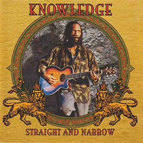 CD cover featuring a portrait of a dreadlocked musician with a guitar.