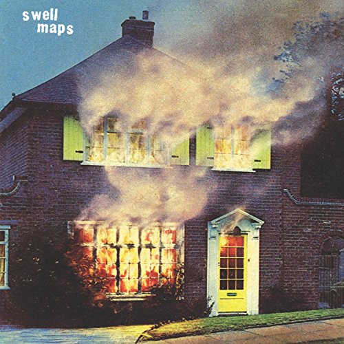 Burning house with smoke, album cover for Swell Maps’ “A Trip To Marineville”.