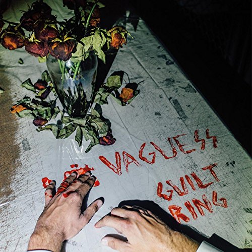 Album cover: wilted roses, red writing, and a hand with red marks.