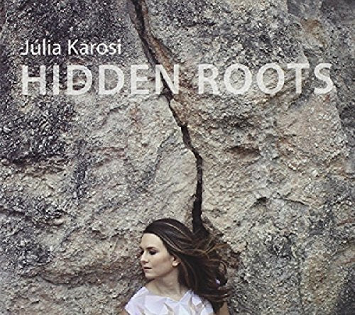 CD cover for Julia Karosi’s “Hidden Roots” featuring a woman and cracked wall.
