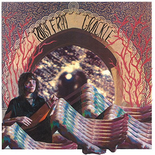 Album cover for Ruby Fray’s “Grackle” featuring a woman with a guitar.
