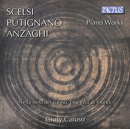 CD cover for Giusy Caruso’s “Piano Works” with concentric wooden rings.