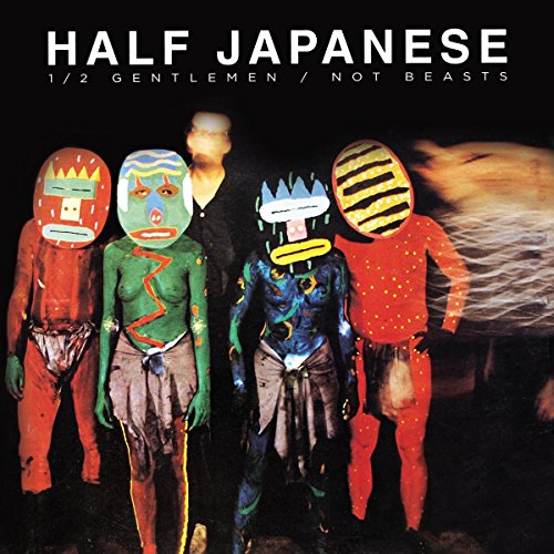 Album cover: Four figures with painted faces and minimal clothing.
