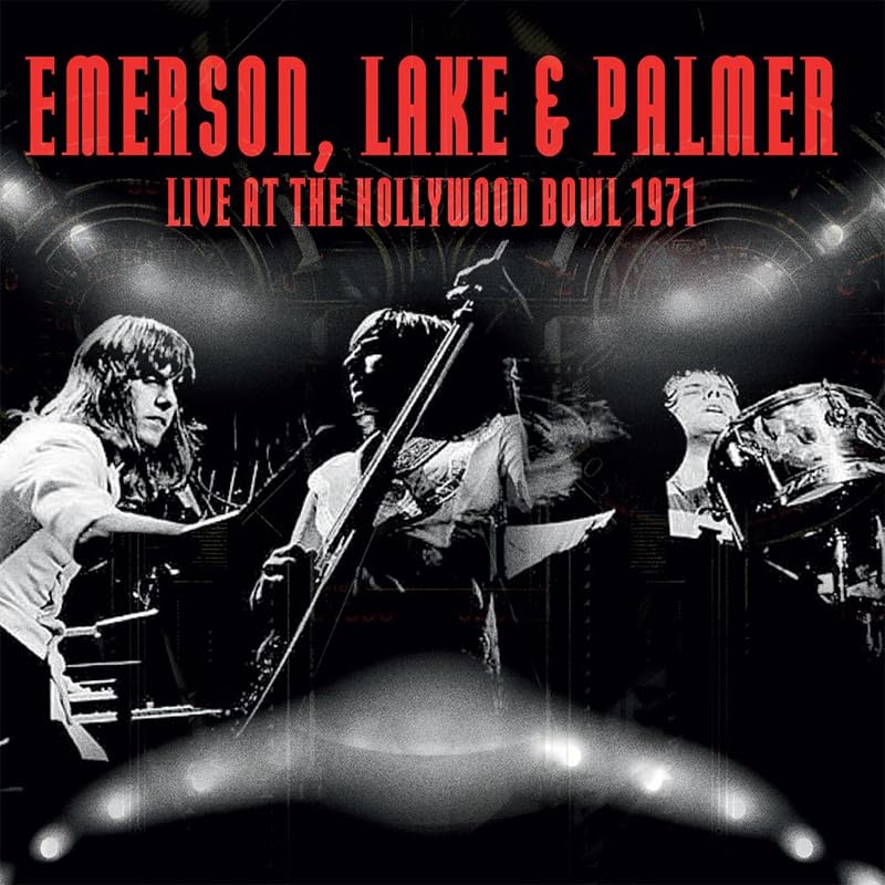 Emerson, Lake & Palmer live album cover featuring musicians in performance.