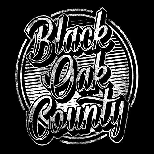 Black and white distressed logo for "Black Oak County" band.