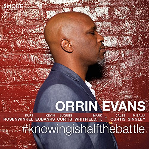 CD cover featuring a portrait of Orrin Evans against a red brick wall.