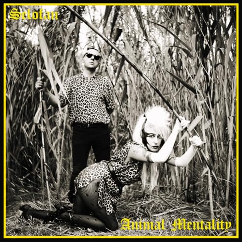 Black and white album cover featuring two people in tall grass.