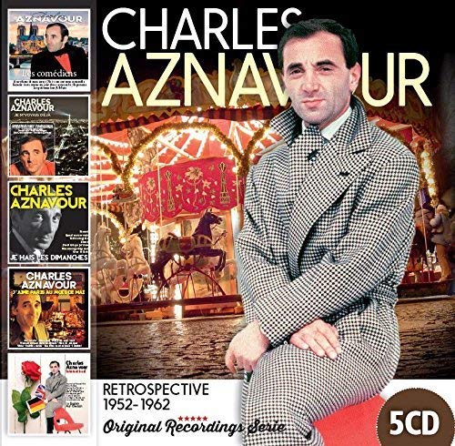 Charles Aznavour CD cover featuring the singer in a checkered suit.