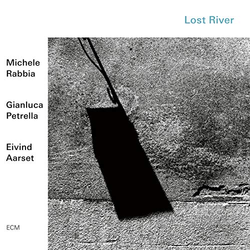 CD cover: black and white abstract image with artist names listed.