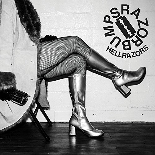 Black and white album cover featuring a person in boots and fishnet stockings.