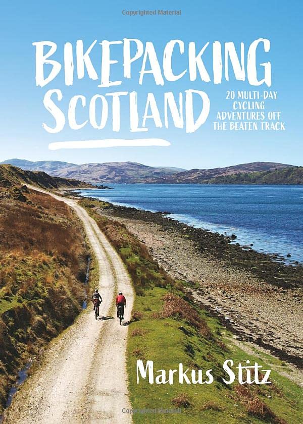 Image of a cycling guidebook cover featuring Scottish landscape with bicycle in foreground.