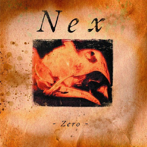 CD cover for "Nex - Zero" with a distressed, fiery image.