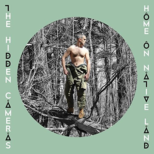 CD cover: shirtless man in woods, circular black and white image.