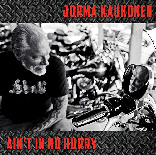 Jorma Kaukonen album cover, black and white photo of a man and motorcycle.