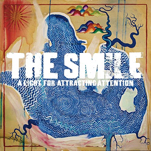 Album cover for The Smile, featuring abstract blue and white artwork.