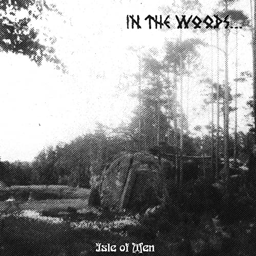 Black and white album cover with textured forest and text.
