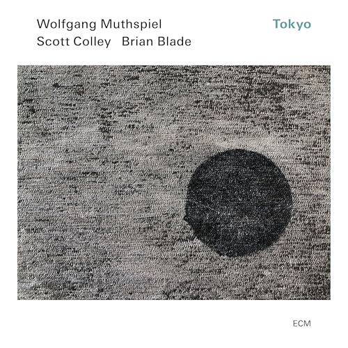 CD cover for "Muthspiel - Tokyo" with textured gray and black circle.
