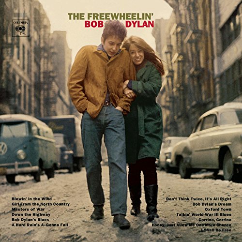 Bob Dylan album cover: Dylan and a woman walking down a city street.