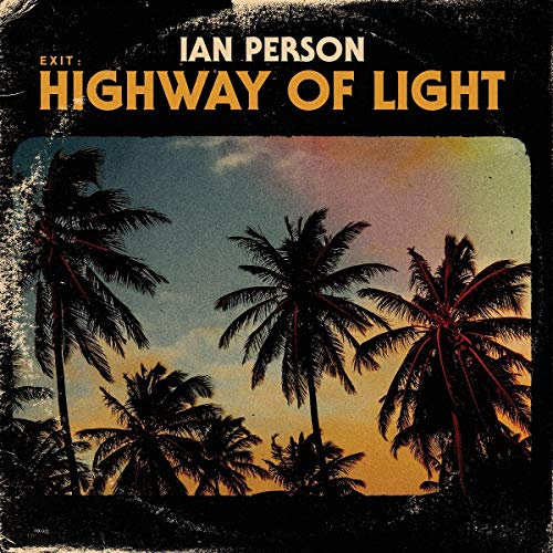 Album cover: silhouetted palm trees against a vibrant sunset sky.
